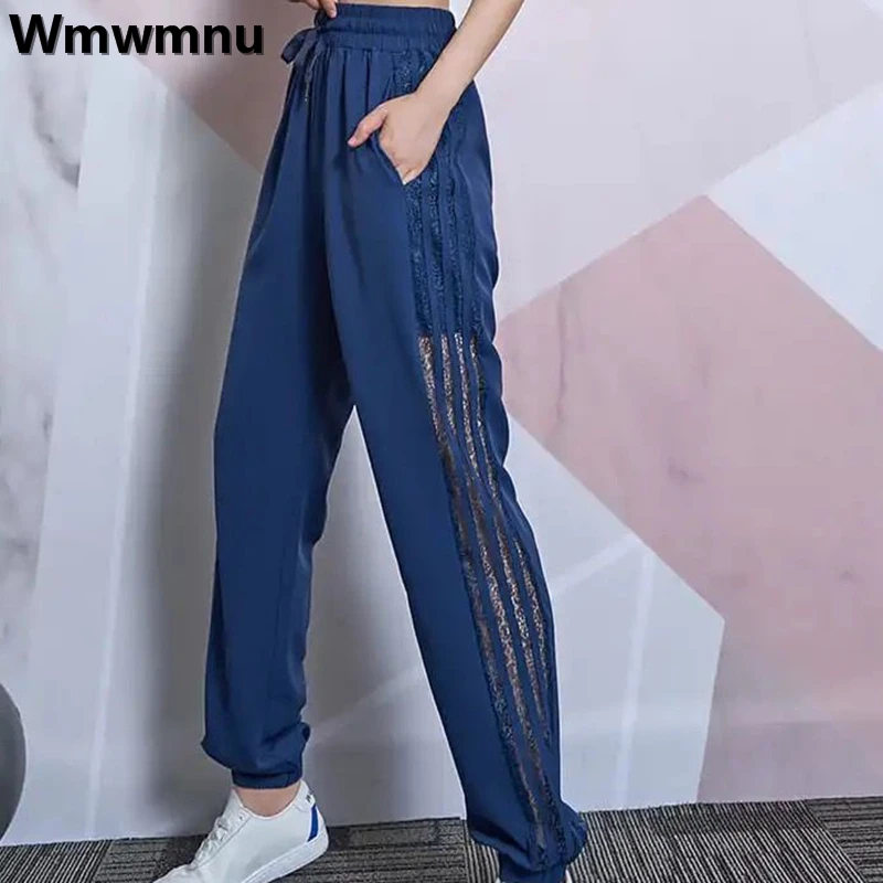 

Спортивные брюки большого размера 4XL с боковой полосой, Мешковатые повседневные штаны с высокой талией, женские шаровары в Корейском стиле, брюки для бега на весну и лето