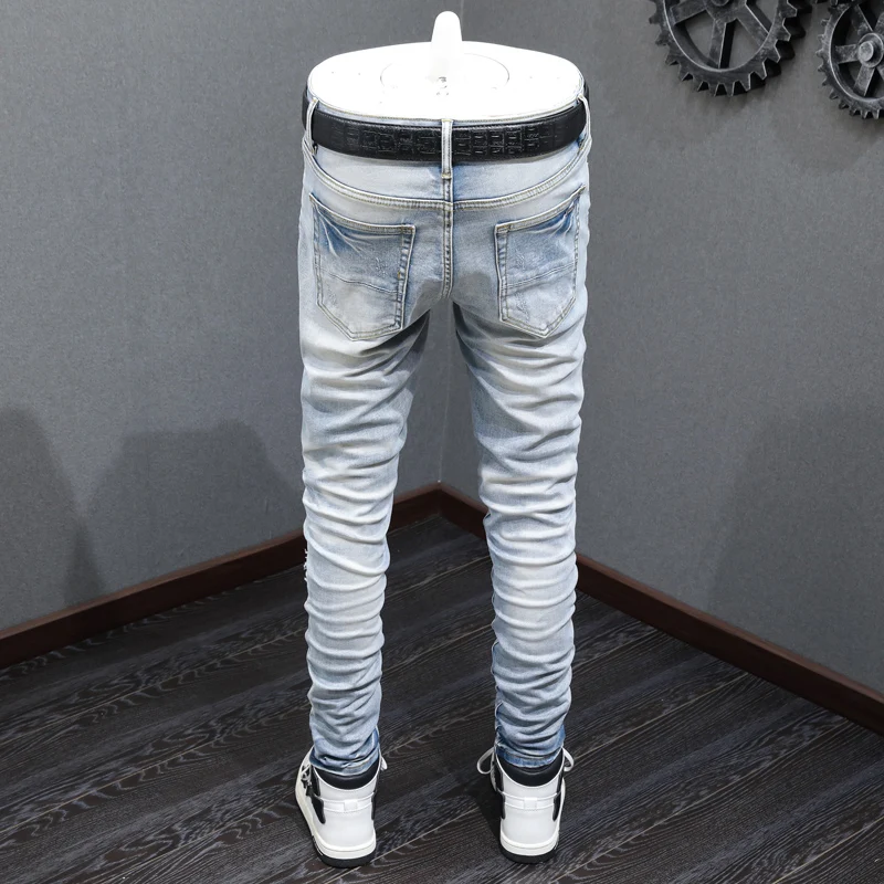 High Street Fashion Men Jeans Retro Light Blue Elastic Skinny Fit Ripped Jeans Men Leather Patched Designer Hip Hop Brand Pants