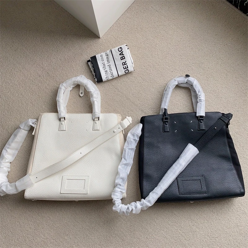 

2023 New M Six 5Ac Top Layer Cowhide Large Capacity Leisure Business Computer Bag Hand Bill Shoulder Crossbody Backpack MM