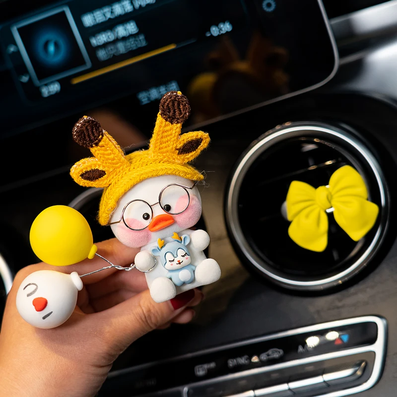 

Car Fragrance Cute Cartoon Duck With Bow-knot Interior Decoration Accessories Air Outlet Goodies Cream Car Perfume Ornaments Gif
