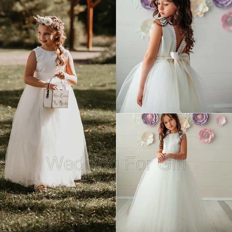 

Kids Champagne Puffy Flower Girl Dress Pearls Beadings Bow First Communion Dresses Backless Tulle Sashes Kids Little Bride Gowns