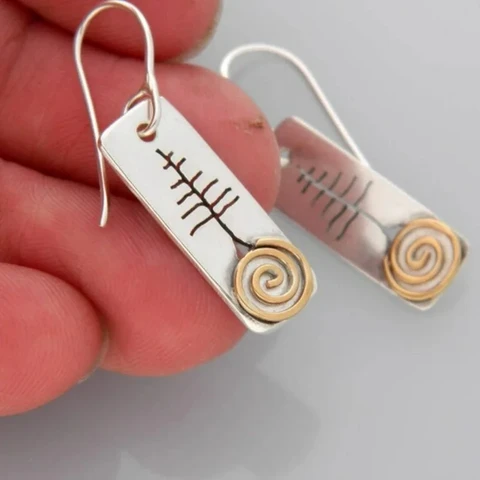 Серьги НовоПублик серебряного цвета