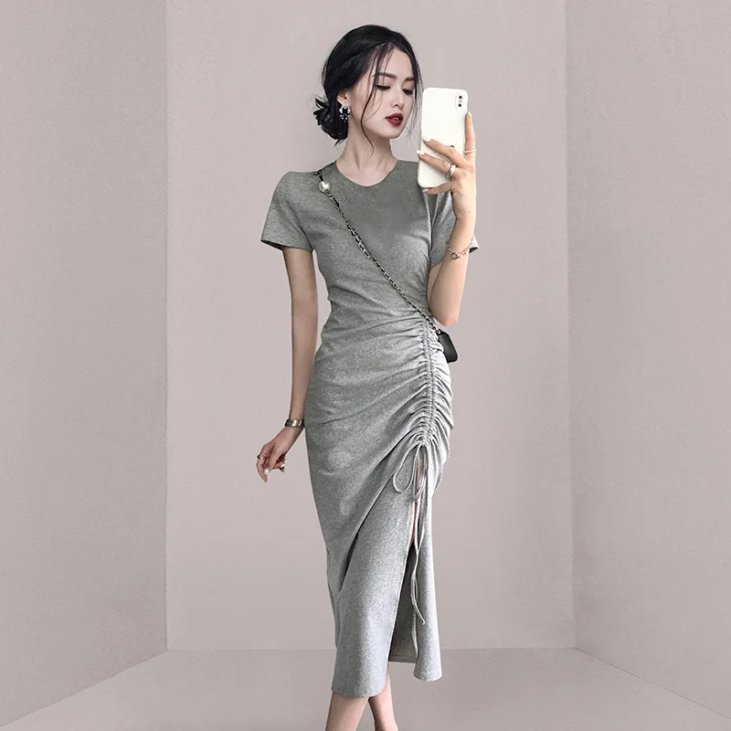 

Temperament crewneck drawstring dress 2023 summer new stretch mid-length split pleated hip skirt