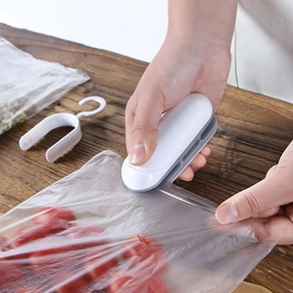 

Household Handy Mini Snacks Seam Welding Machines Clips Kitchen Machine Food Vacuum Sealing Pressure Preservation Hand Supp G4M4