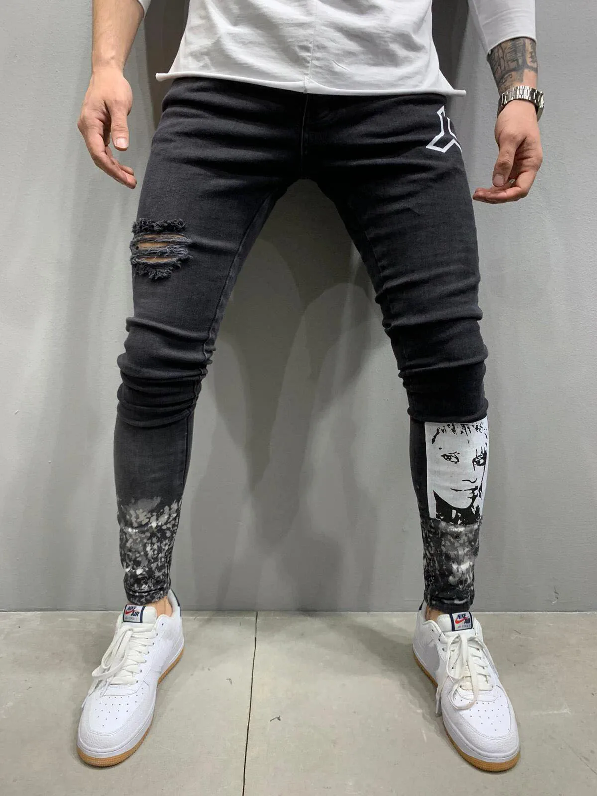 New Men's Jeans Ripped Print Jeans Men's Four Seasons Leisure Travel Pants Fashion Youth Sports Pencil Pants Black Denim Men