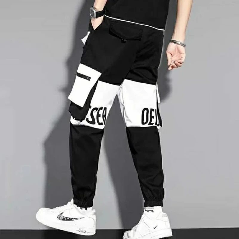 Брюки-карго мужские эластичные с карманами и надписью