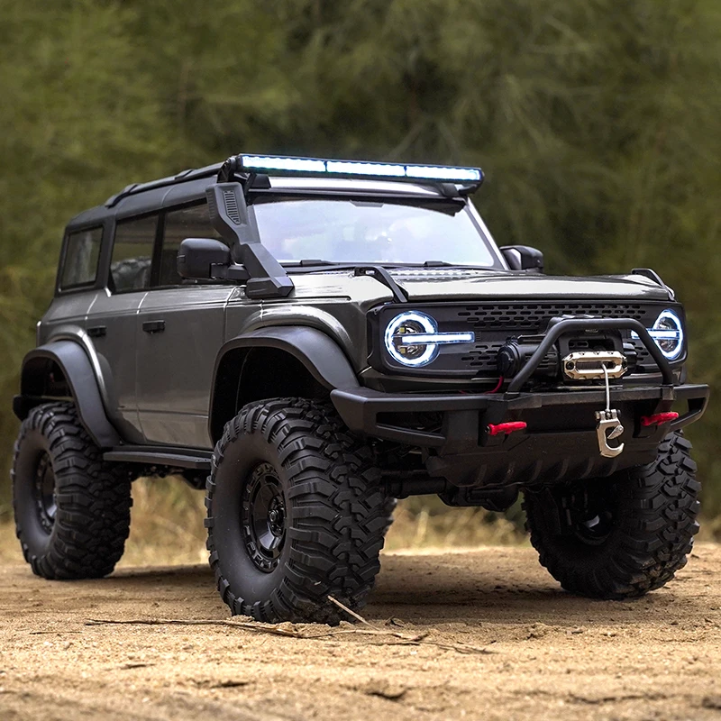 Фото Huangbo R1001 1/10 Радиоуправляемый автомобиль 2,4 г Полномасштабная имитация альпинизма Модель внедорожника для взрослых мальчиков Игрушки с дистанционным управлением Рождественский подарок №1