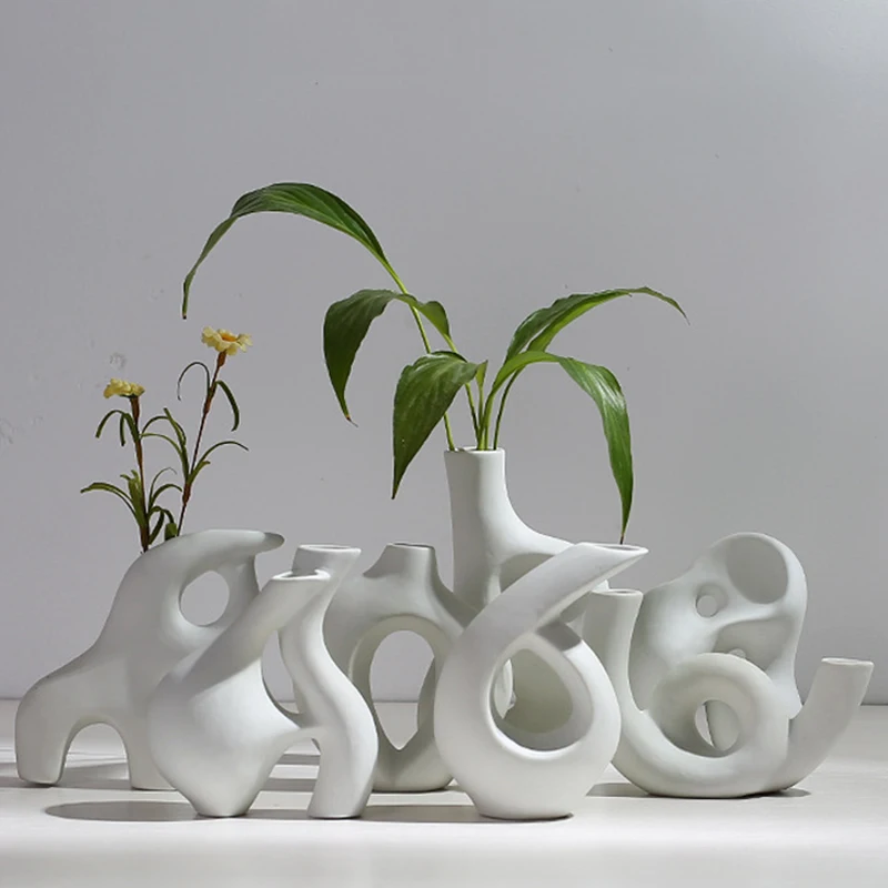 

Abstract Art Ceramic Vase Nordic Minimalist Hydroponic Flower Pot Decor for Home Wedding Party Plants Unglazed vase ceramique