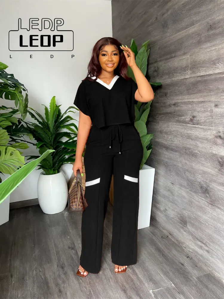 

Spring and Autumn Fashion Temperament and Elegant Two-piece Women Casual Short-sleeved T-shirt Sports Suit Straight Pants Women