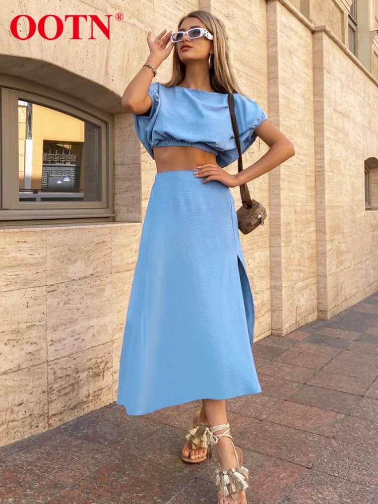 

Элегантный комплект OOTN из двух предметов, короткий топ с круглым вырезом и рукавом летучая мышь, летние юбки, Женская юбка с разрезом и высок...