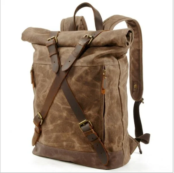 

Free Shipping,Leisure student backpack,vintage oil wax canvas schoolbag.Durable travel bag,leather backpack.classic trend bag.