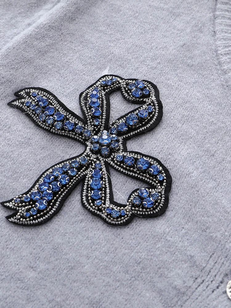 Женский трикотажный кардиган с круглым вырезом осень 2024