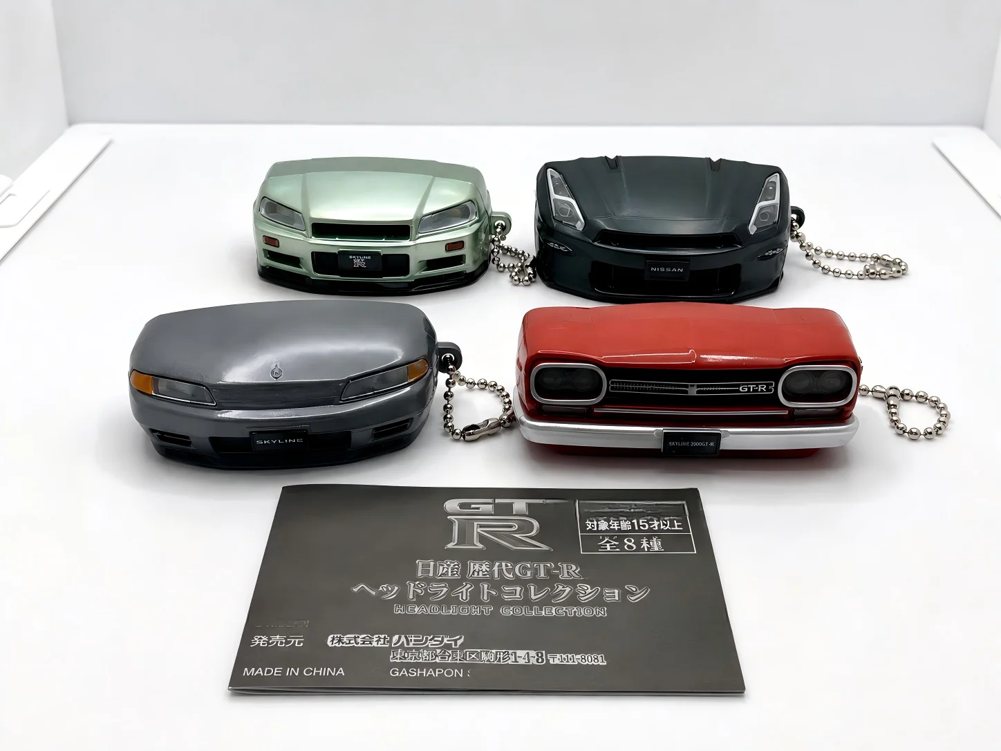 Фото Оригинальные капсульные игрушки: милые кавайные фигурки GT-R Generations с фарами, звуком и светом, коллекционные брелоки-подвески Gachapon №2