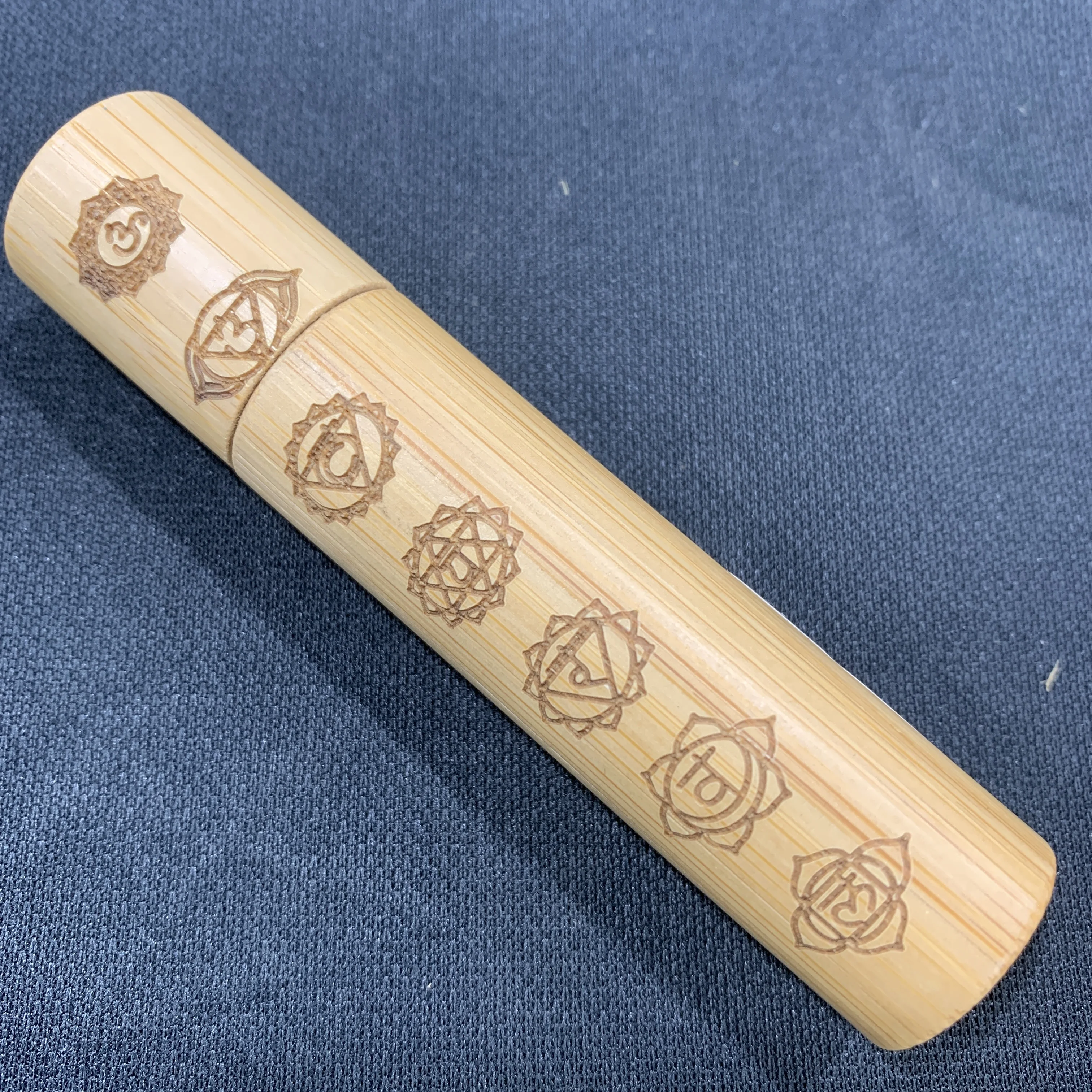 

Bamboo oil bottle with Seven chakra pattern