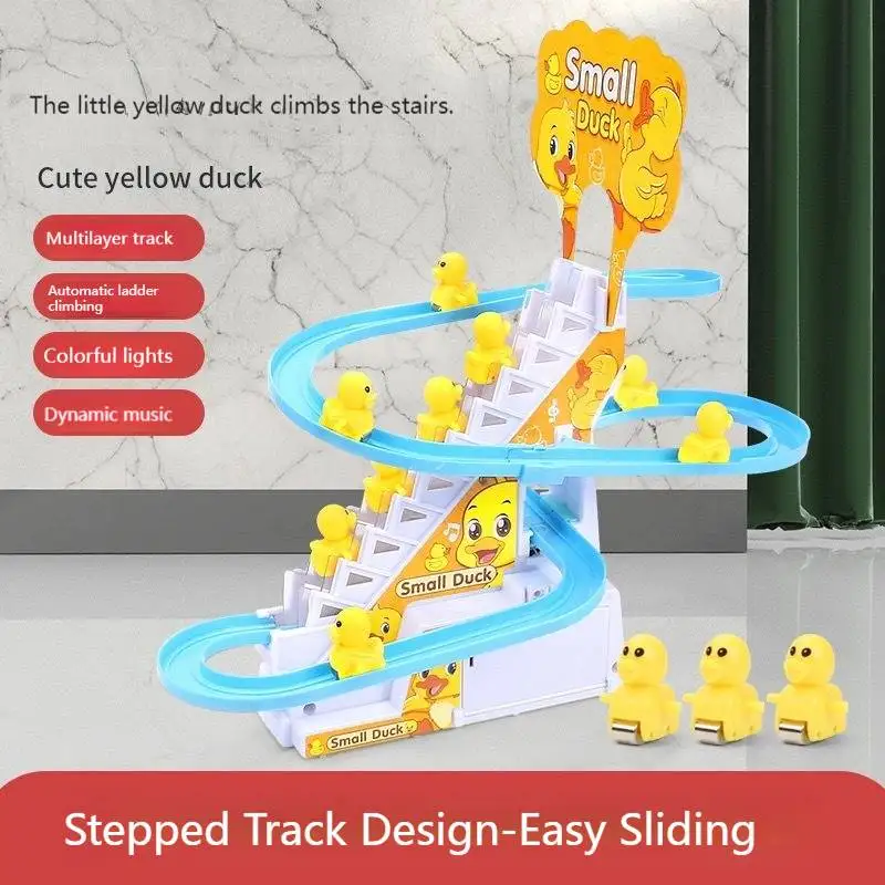 

Little duck climbs stairs to assemble automatic track little yellow duck slides music boys and girls toy color box
