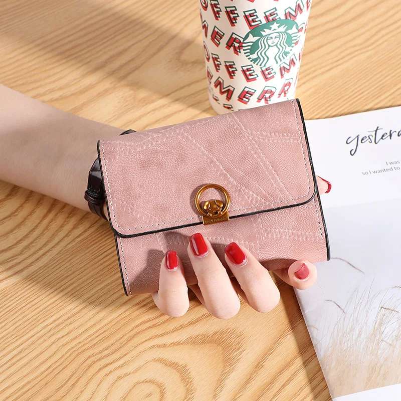 

2023 new Korean version of small purse female short European and American ins retro simple buckle card bag soft wallet purse