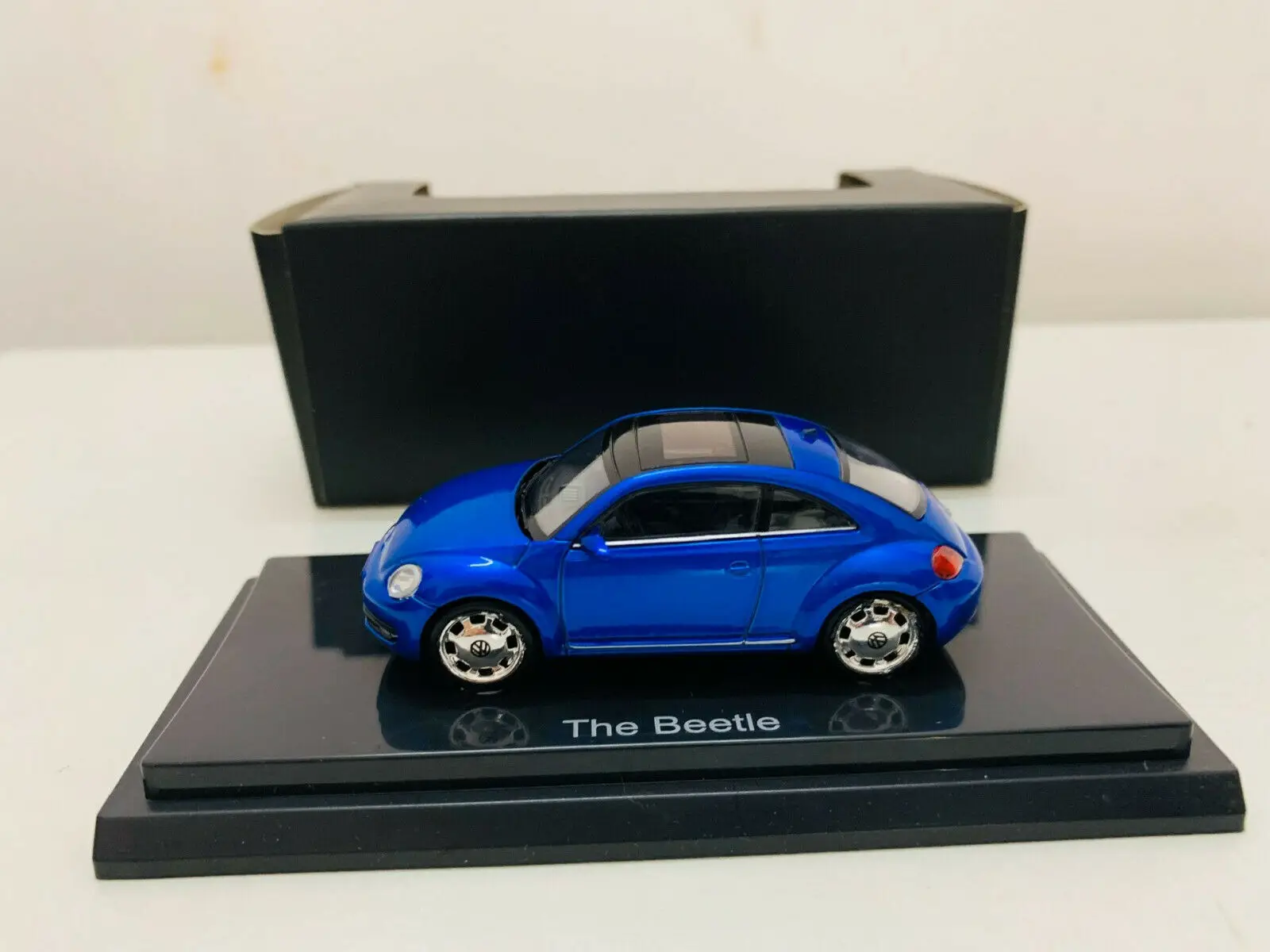 

Модель автомобиля выпуска под давлением Kyosho в масштабе 1:64, новая в коробке