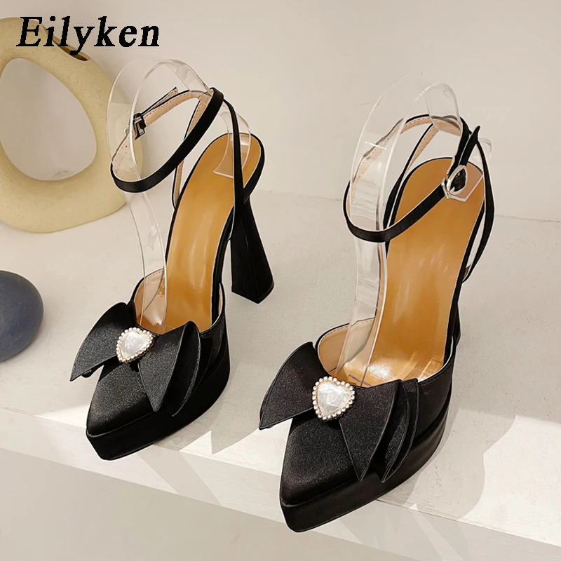 

Eilyken/Размеры 35-42; Женские туфли-лодочки на высоком каблуке с бантом; Коллекция 2023 года; Шелковые Летние босоножки на платформе с пряжкой и рем...