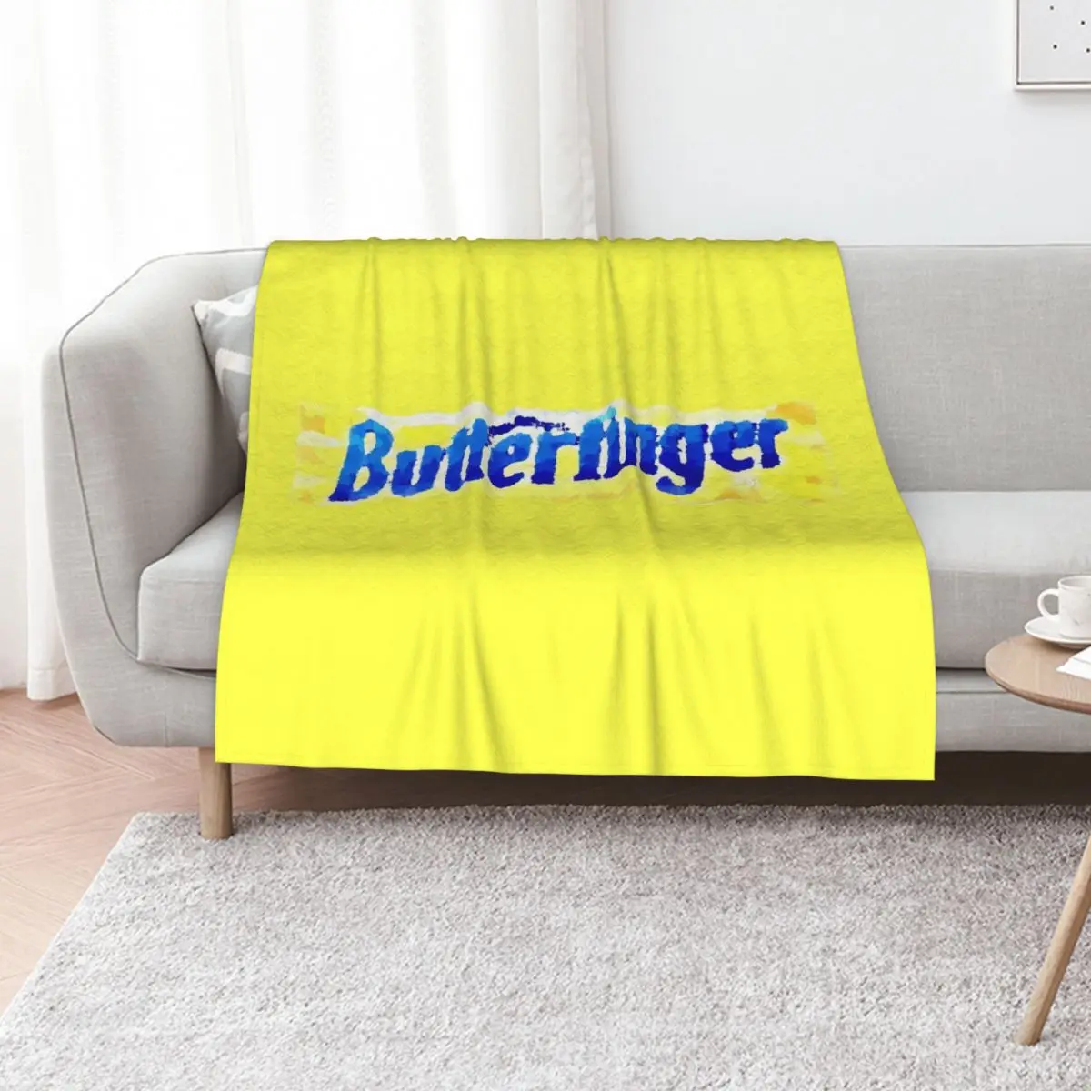 Фото Плед с рисунком упаковки конфет Butterfinger в пастельных тонах, мягкий и теплый плед, подарок для мужчин, женщин и взрослых. №1