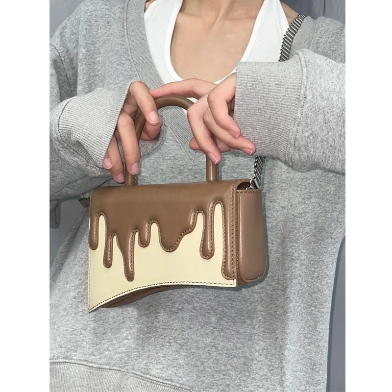 

Chocolate flow bag 2022 autumn and winter new portable slung bag
