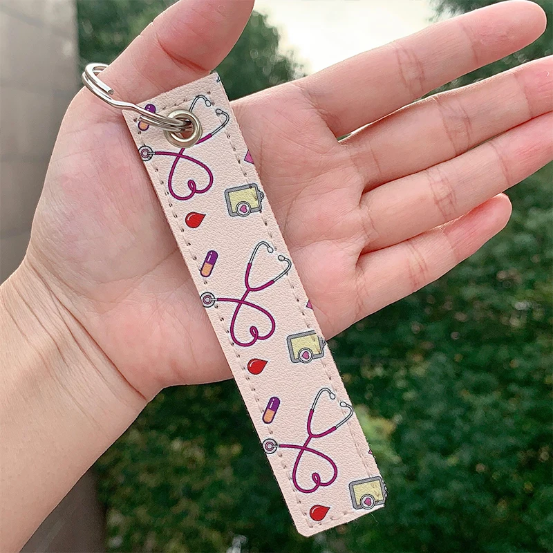 

Fashion Nursing Life leather motorcycle Custom Key chain Strap Key rings Hanging Holder Bag Wallet Trinket Keychain Hanging Bag