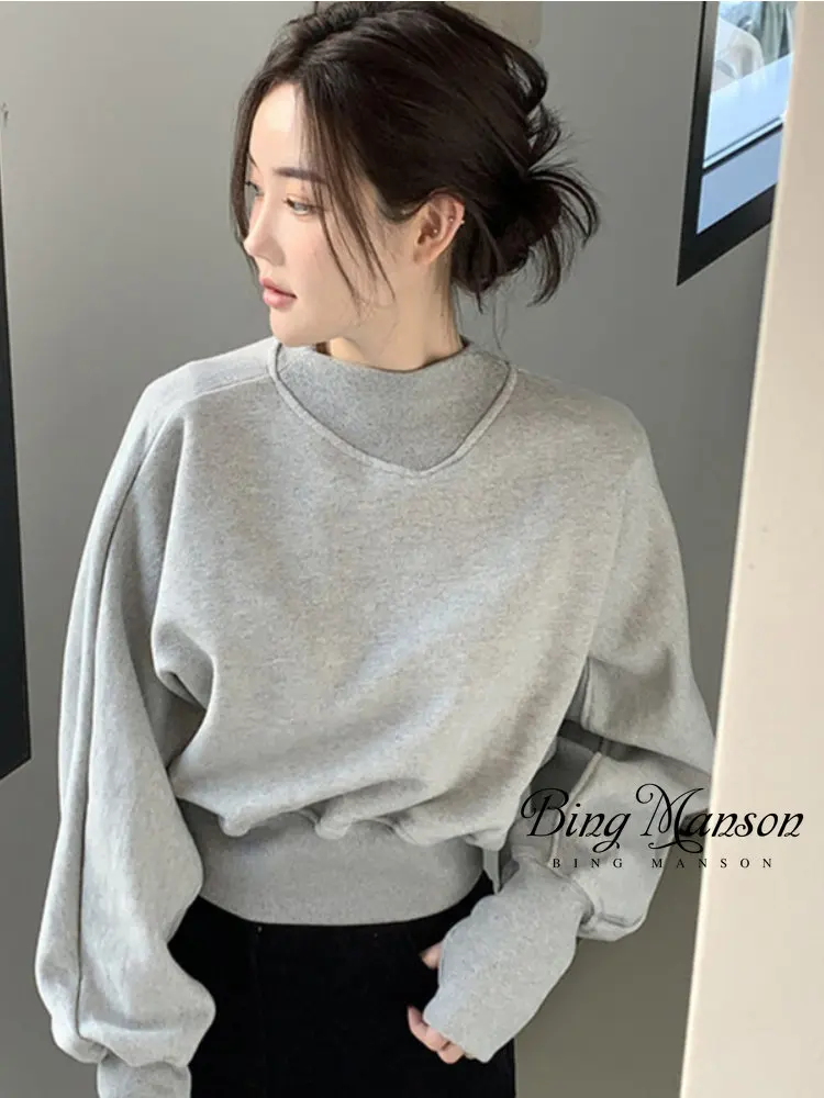 

2022 New Loose Casual Peplum Top Splicing Fashion Thin Sleeve Long-sleeved Short Section Sweater Female Pullover
