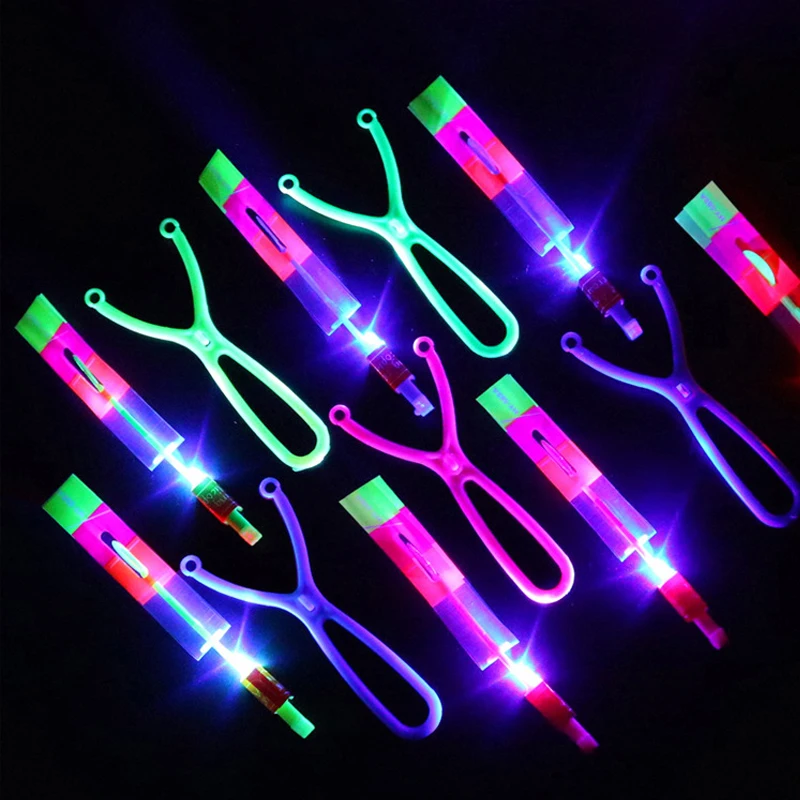 

50/100pcs Amazing Light Toy Arrow Rocket Helicopter Flying Toy LED Light Toys Party Fun Gift Rubber Band Catapult