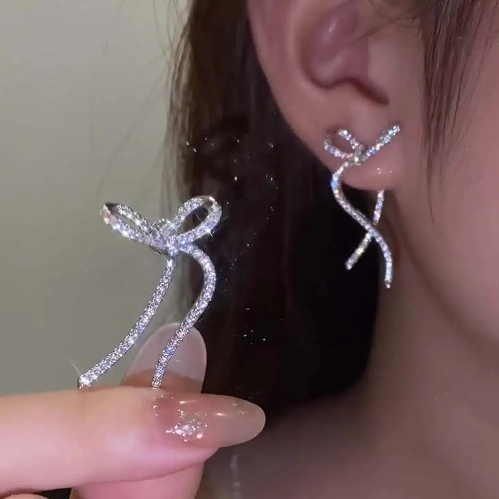 

Hot Selling Ribbon Bow Silver Color Drop Earrings Korean Style Women Earrings Zircon Bow Earrings Rhinestone Bow Ear Studs