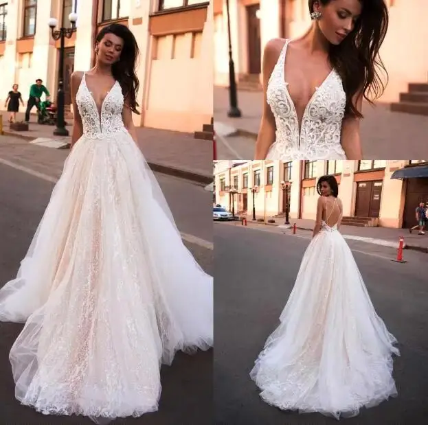 

Romantic Lace Backless A-Line Wedding Dresses Luxury Sleeveless Spaghetti Strap Bride Dresses Appliques V-Neck Robe de Mariee