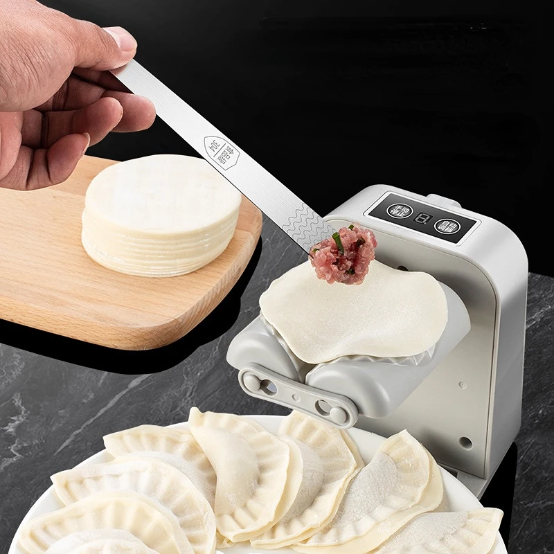 

Electric Dumpling Wrapping Machine for Automatically Wrapping Jiaozi Artifacts Pressing Dumpling Skins and Kneading Dumplings.