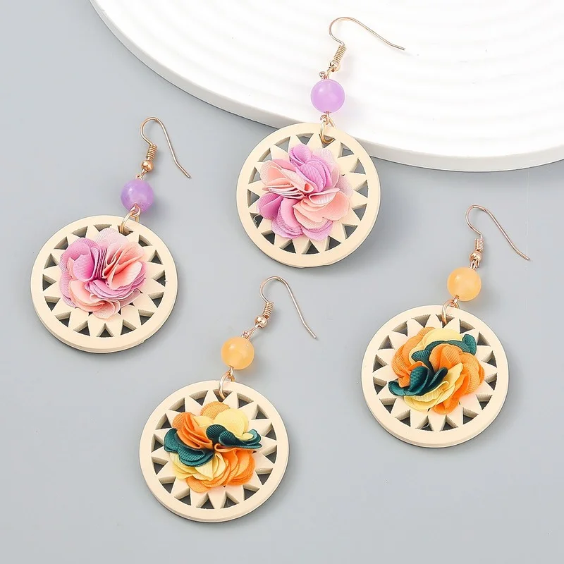 

2022 retail women's Earrings new design high quality hand woven Flower Earrings Jewelry round personality hollow latest