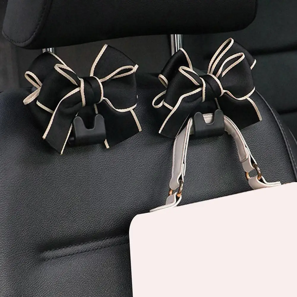 

Милые крючки для хранения в автомобиле с бантом, органайзер на подголовник автомобиля, вешалка для продуктов, сумочки, автомобильный аксессуар U2e3