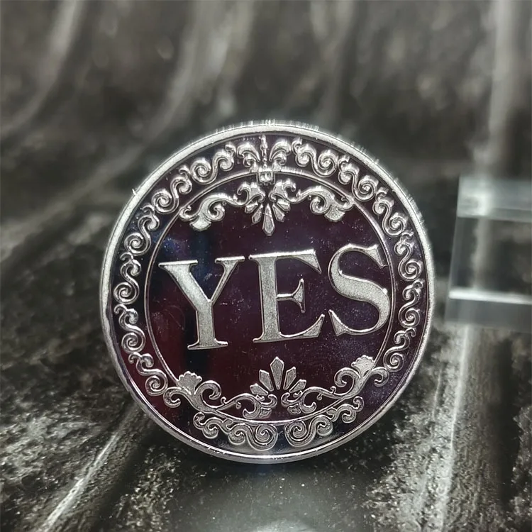 

Двухсторонняя памятная монета YES или NO