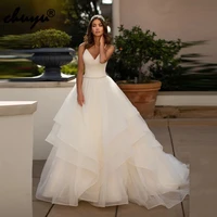 modern simple organza aline sleeveless wedding gowns sweetheart for bride cross back beaded unique design formal occasion