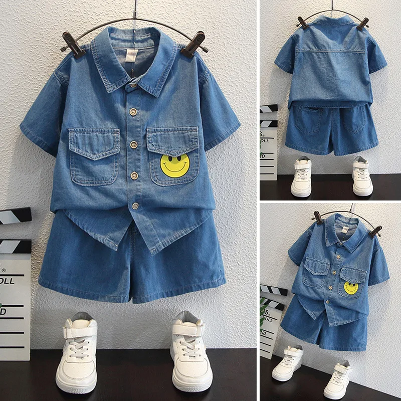 

Boys summer denim suit 2022 new style children's handsome short-sleeved boy smiling face two-piece suit 2-8 years old