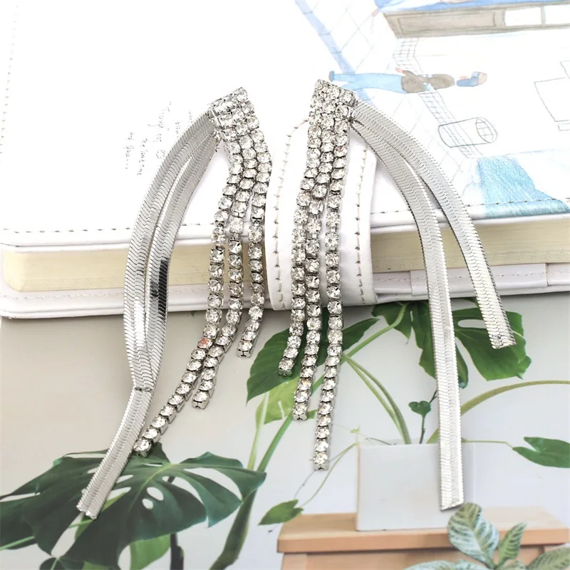 

Европейские и американские личные темпераментные геометрические серьги-кисточки с цепочкой с когтями длинные медные серьги-цепочки с блес...