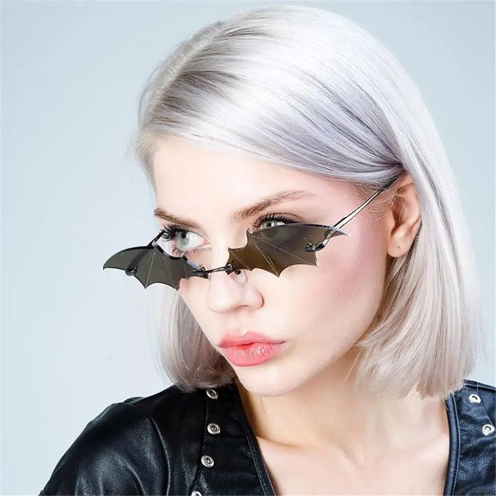 

2022 New Trendy Women Sunglasses Bat Shaped Slim Sunglasses Metal Frame Rimless Sun Glasses Novelty Cosplay Party Eyewear