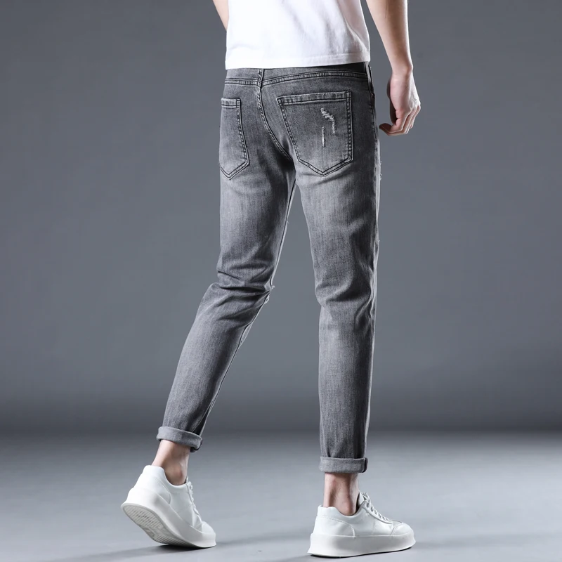 Мужские узкие джинсы в стиле хип-хоп рваные серые эластичные облегающие