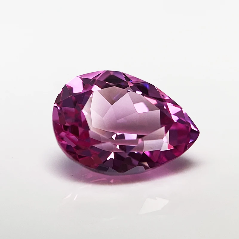 Выращенный в лаборатории сапфир грушевидной формы розового цвета VVS1 подвески