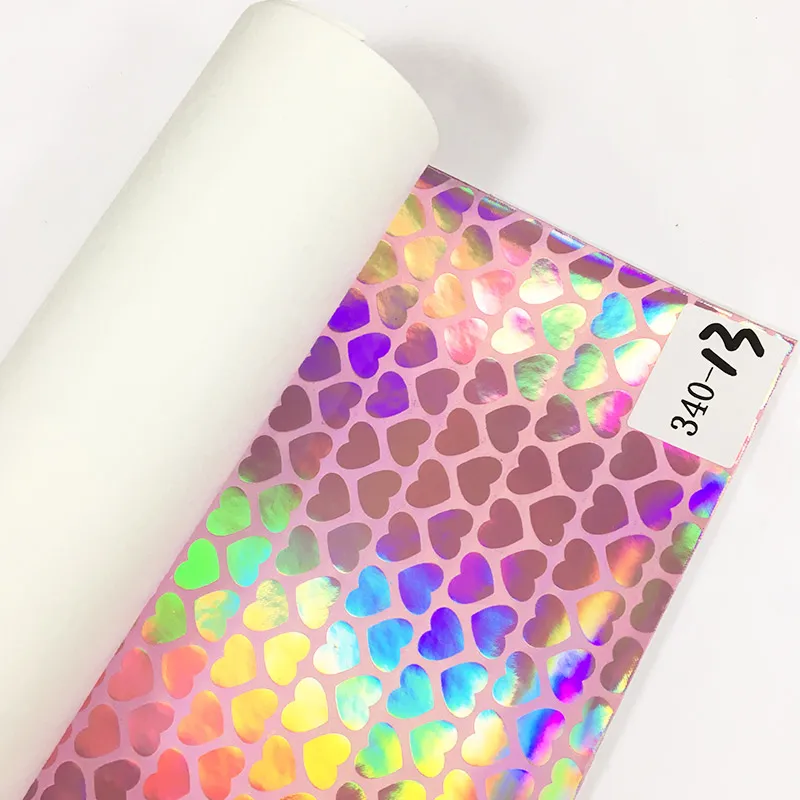 

Heart Shape Pattern Holographic Mirror Reflective Laser Effect PU Embossed Leather Fabric Sheet for Handbag/Decoration