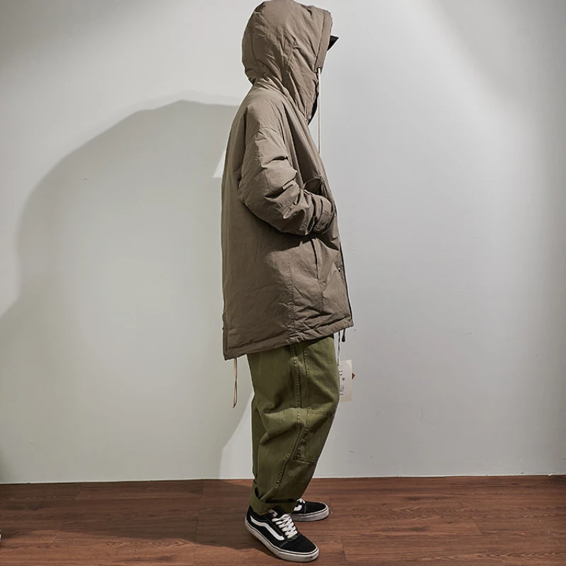 Long down jacket men's winter coat is thickened, and warm and casual solid color hooded coat is worn outside.