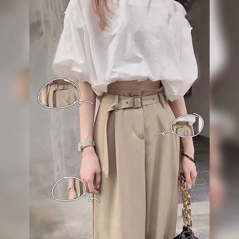 Женский летний костюм из двух предметов облегающий с широкими штанинами лето 2023