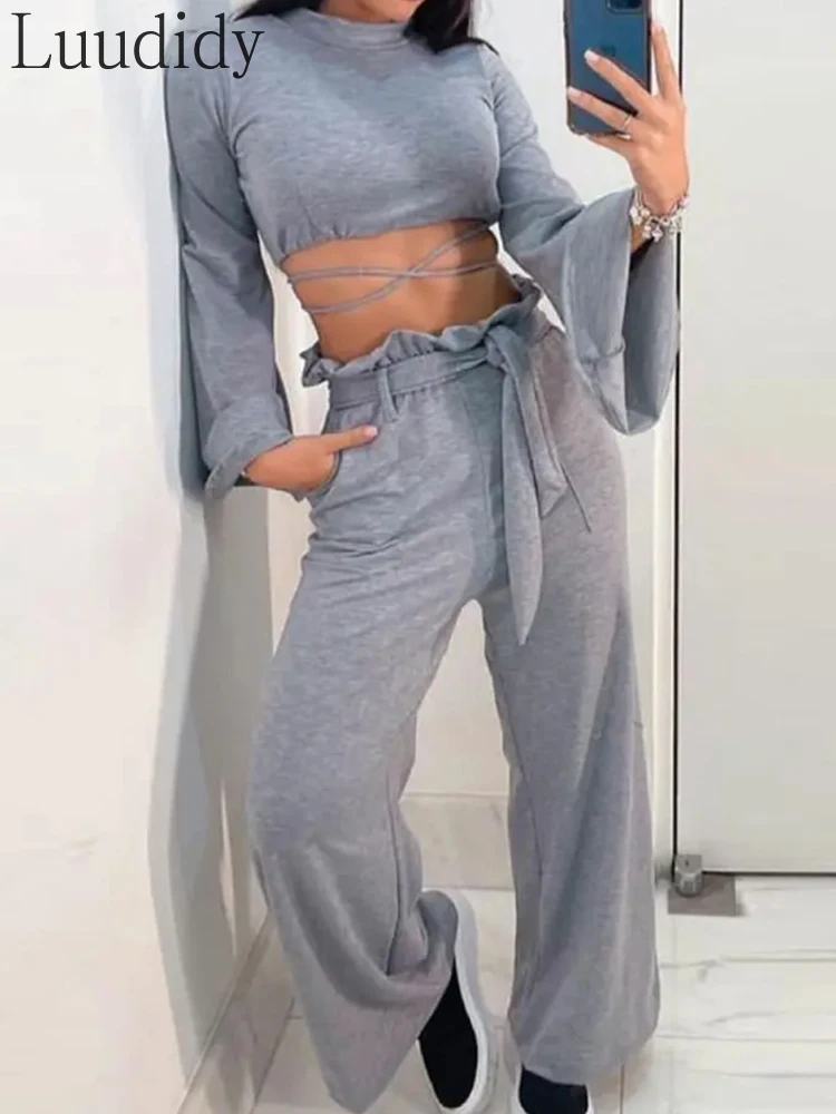 

Women Flared Sleeve Cross Tie Crop Top and Belted Pants Set