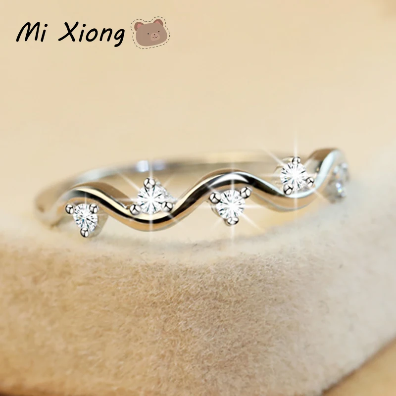 

Кольцо Mi Xiong из серебра 925 пробы с бриллиантами в форме волны