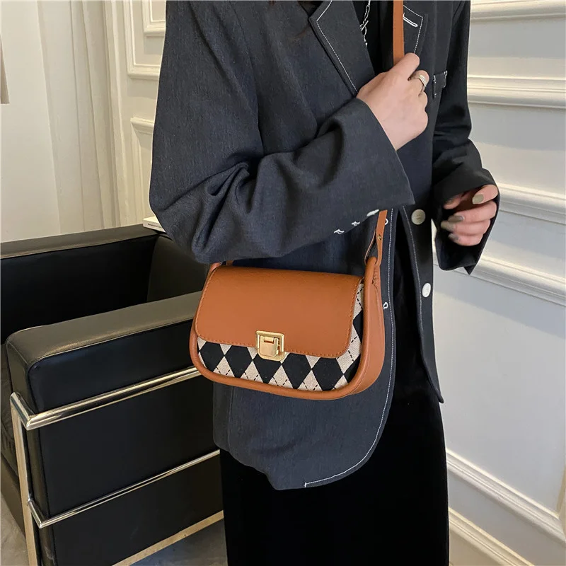 

Splicing design armpit bag women's 2021 new fashion lattice saddle bag simple leisure messenger bag