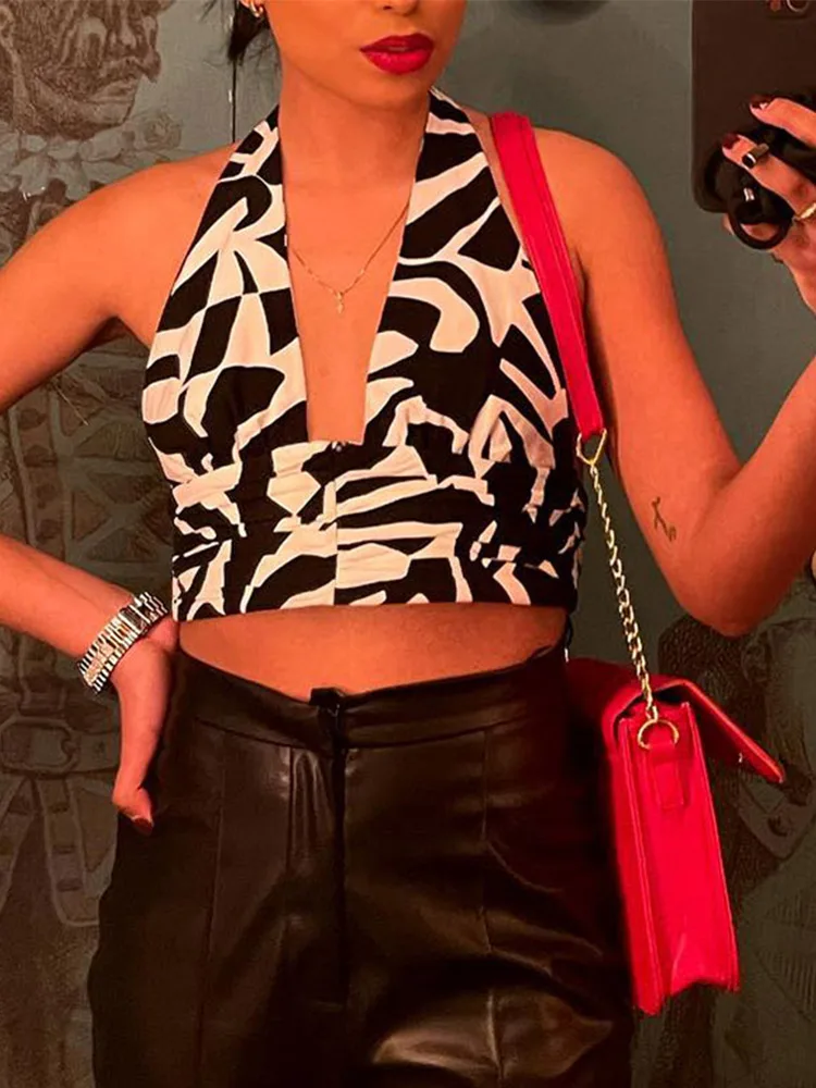 Женский костюм из топа с лямкой на шее и широких брюк высокой талией комплекты