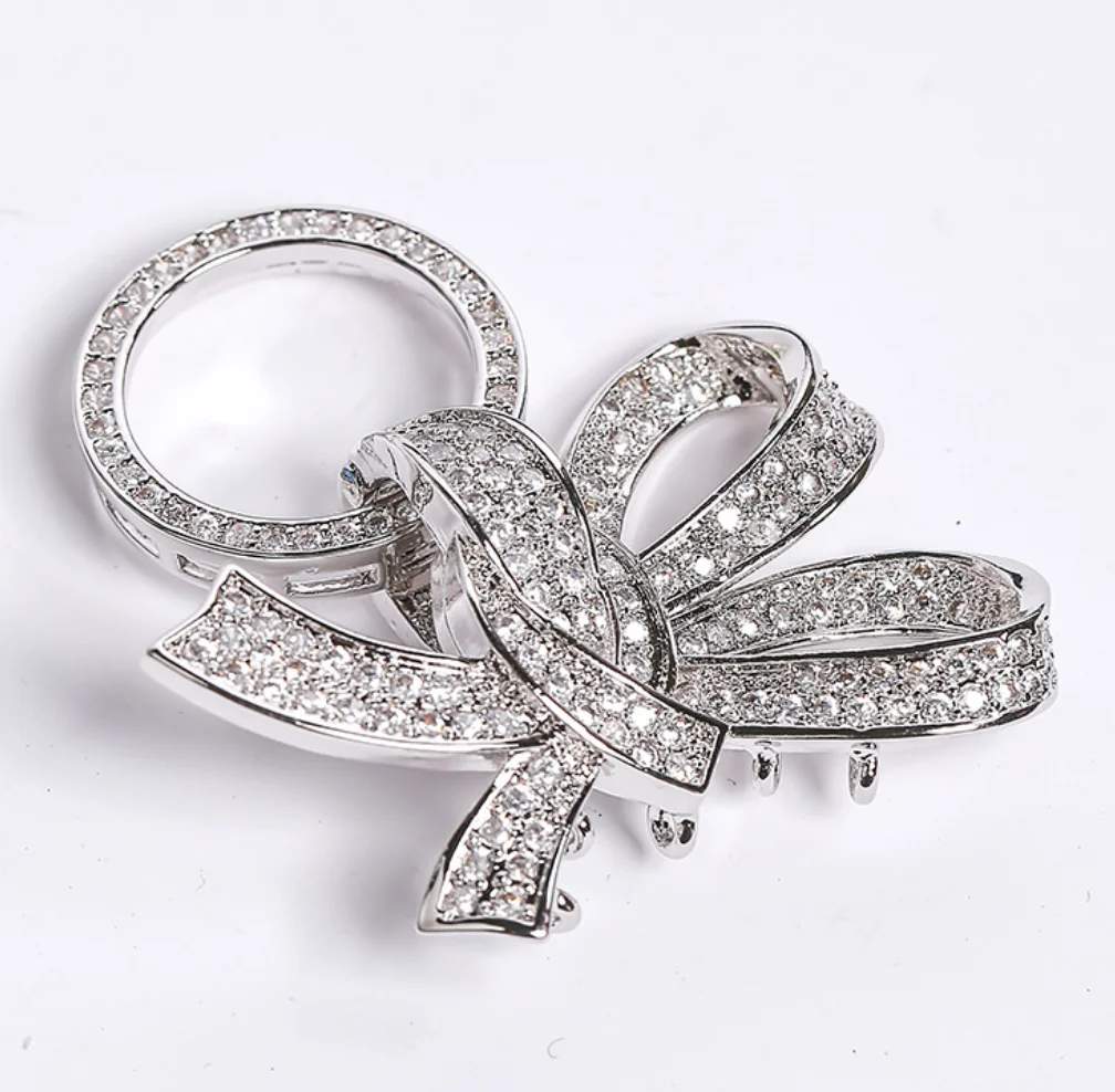 

Wholesale Inlaid bow sweater chain ornament buckle DIY pearl necklace buckle electroplated white gold ornament accessories