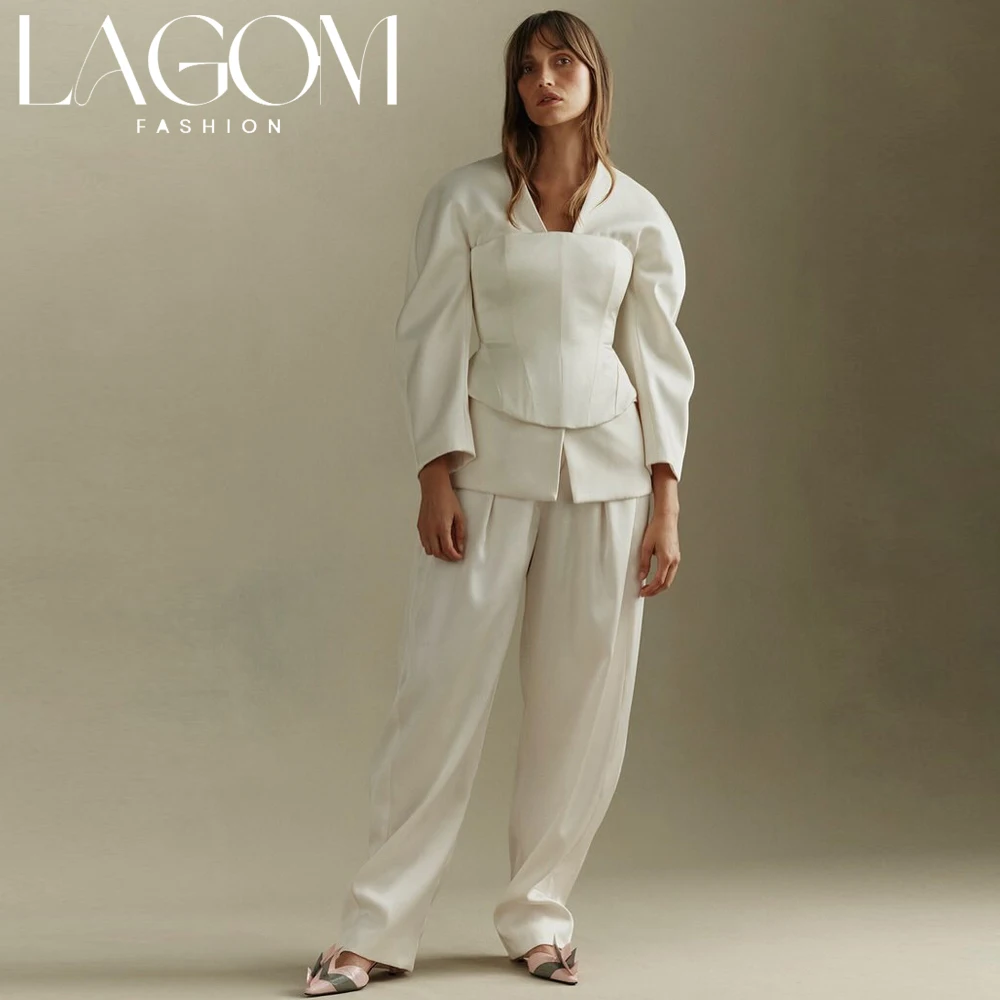 Фото Изысканный свадебный костюм Lagom из 3 предметов: женский жакет с пышными рукавами, корсетный топ, брюки с широкими штанинами, современный свадебный комбинезон, индивидуальный пошив. №1