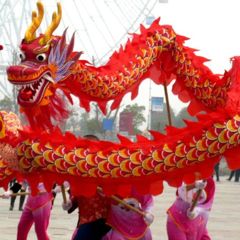 Дракон купить билеты. Дракон маскарад Китай. Китайский дракон костюм. Китайский дракон кукла. Китайский дракон на палках.