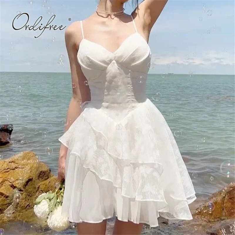 

Ordifree 2022 Summer Women Sexy Mini Dress Spaghetti Strap Corset Dresses White Short Ruffle Beach Dress
